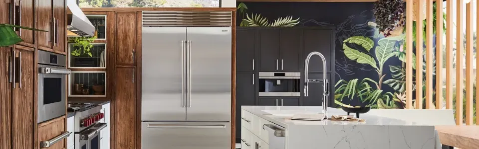 sub zero brand luxury appliances set in a kitchen with deep cherry stained wooden cabinets
